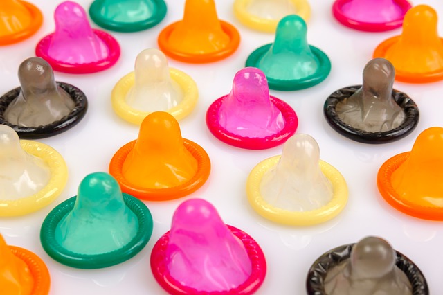 A lot of colorful condoms ready to be used. Article is about Trojan condoms.